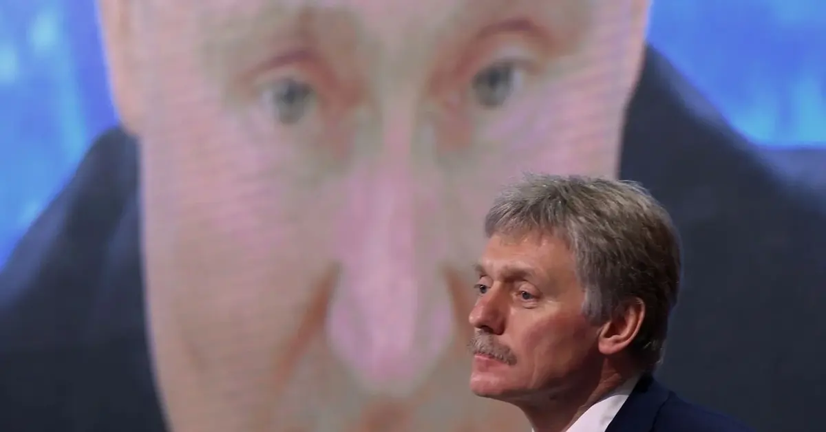 Pieskow na tle Putina