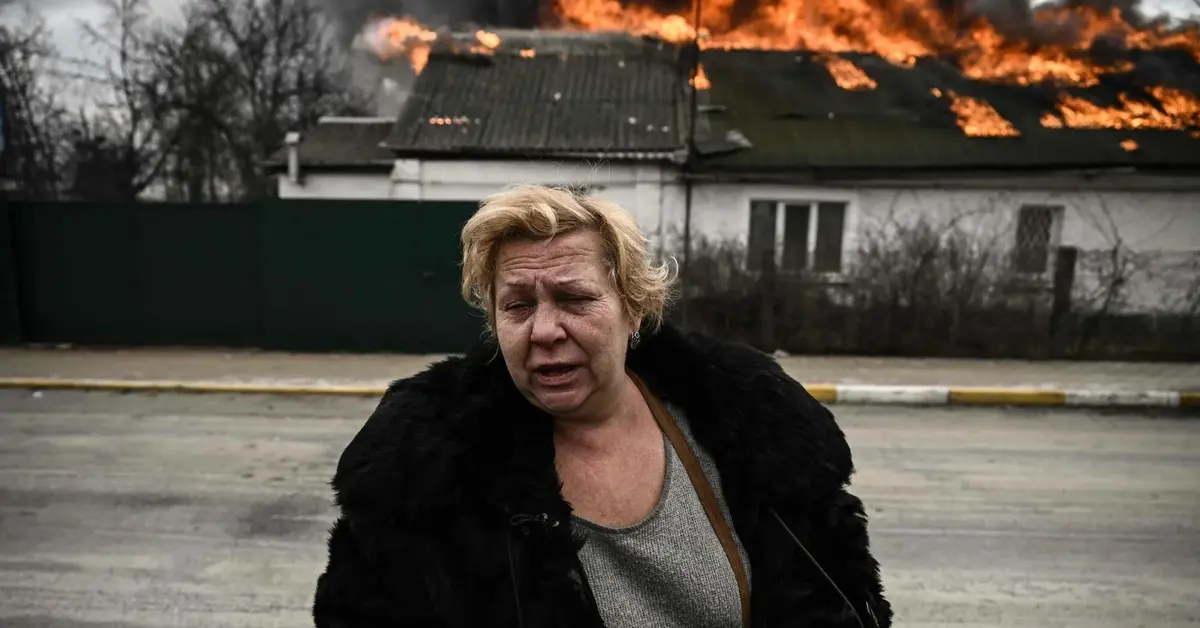 kobieta uciekająca przed pożarem