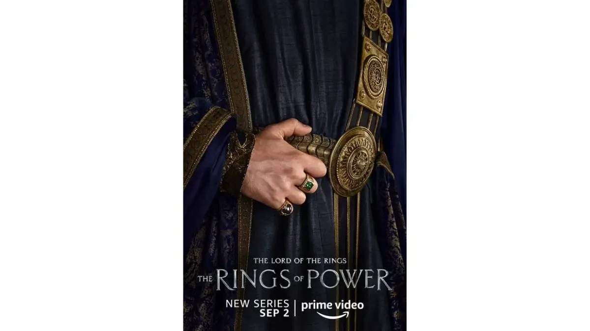 Plakat "Pierścienie władzy":  dłoń i złoty pas