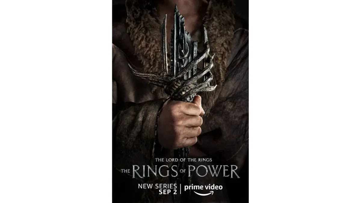 Plakat "Pierścienie władzy": dłonie z magicznym artefaktem