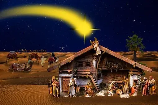 Stajenka z Maryją, Józefem i Dzieciątkiem Jezus oraz spadająca gwiazda w tle
